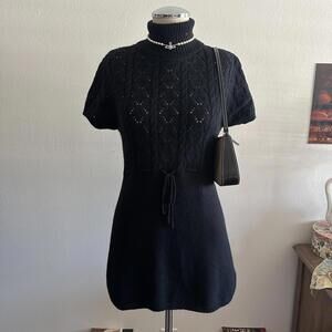 Black babydoll turtleneck sweater dress